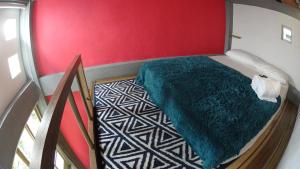 A bed or beds in a room at Imagine hostel