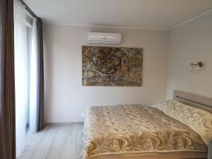 Postel nebo postele na pokoji v ubytování Marių studija