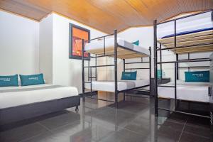 Krevet ili kreveti u jedinici u okviru objekta Hotel Bogota Home