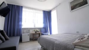 TV a/nebo společenská místnost v ubytování Dom Wczasowy Klif & Spa