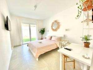 Televiisor ja/või meelelahutuskeskus majutusasutuses Pathos Guest House