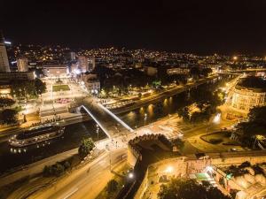 a view of a city at night with street lights at Elite Space in Niš