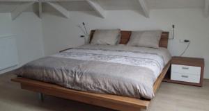 Postel nebo postele na pokoji v ubytování B&B De Kaagse Boer