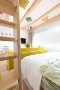 Un pat sau paturi într-o cameră la RASL House