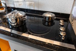 Kuhinja ili čajna kuhinja u objektu Homelike Faria Lima by Okaeri Home Vista Incrível, Piscina e Estacionamento em Pinheiros