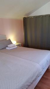 Cama o camas de una habitación en Villa Claudia