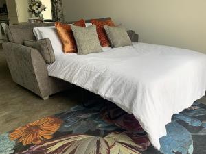 Ліжко або ліжка в номері Springmount Accommodation