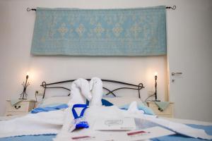 Postel nebo postele na pokoji v ubytování Holiday Room Sa Tebia