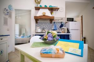 Kuchyň nebo kuchyňský kout v ubytování Holiday Room Sa Tebia