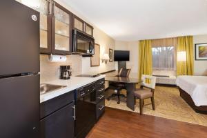 A kitchen or kitchenette at Candlewood Suites Huntersville-Lake Norman Area, an IHG Hotel