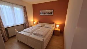 Postel nebo postele na pokoji v ubytování Appartement Alpenperle