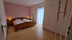 Postel nebo postele na pokoji v ubytování Appartement Alpenperle + 6 fotografií
