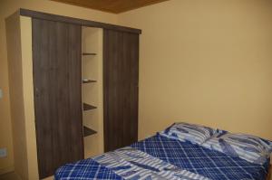 Ένα ή περισσότερα κρεβάτια σε δωμάτιο στο Aguasclaras Residencial
