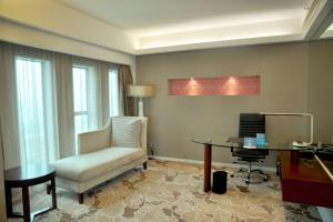 Cama ou camas em um quarto em Radisson Blu Hotel Liuzhou