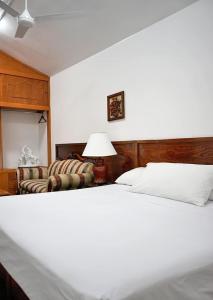 En eller flere senger på et rom på Hotel CALLI YOLOTL Teotihuacan