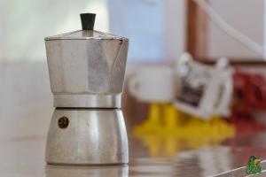a silver blender sitting on top of a table at Hotel La Jungla in Puerto Villamil