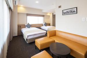 Voodi või voodid majutusasutuse Flexstay Inn Sakuragicho toas