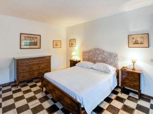 Giường trong phòng chung tại Belvilla by OYO Villa Adriana