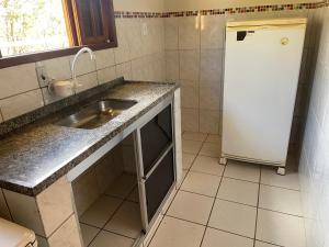 A cozinha ou kitchenette de Casa Amarela