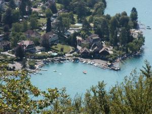 an aerial view of a lake with boats in it at La Mazzerinière in Saint-Sylvestre