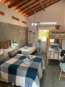 Ένα ή περισσότερα κρεβάτια σε δωμάτιο στο FLATS MACAPÁ MEU AMOR 7