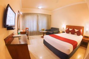 Postel nebo postele na pokoji v ubytování President Hotel
