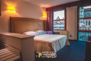 Afbeelding uit fotogalerij van Panoramic Rooms Torre della Vittoria in Ferrara