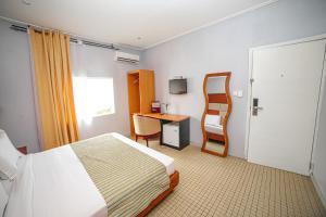 Postel nebo postele na pokoji v ubytování Fini Hotel Bobende