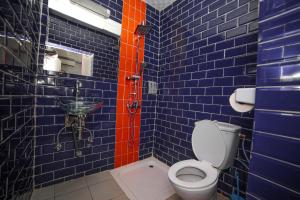 Koupelna v ubytování Fini Hotel Bobende