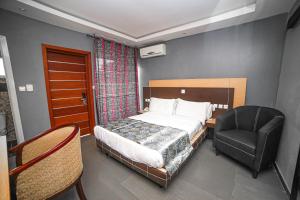 Postel nebo postele na pokoji v ubytování Fini Hotel Bobende