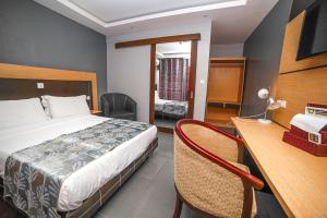 Postel nebo postele na pokoji v ubytování Fini Hotel Bobende