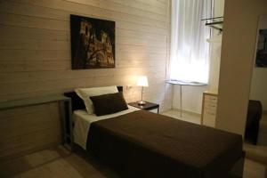 Postel nebo postele na pokoji v ubytování White albergo diffuso Ristorante & SPA