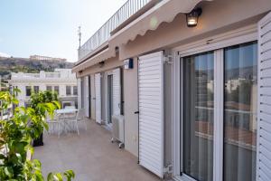Balkón alebo terasa v ubytovaní ERMOU STREET APARTMENTs