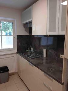 Kép Modern Flat incl Parking, near Metro U1 szállásáról Bécsben a galériában