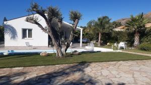 a villa with a pool and a house at Eucalipto new private pool in Castellammare del Golfo