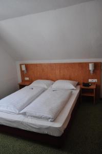 Posteľ alebo postele v izbe v ubytovaní Hotel Tauernpasshöhe