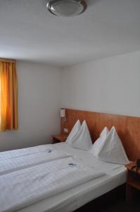 Posteľ alebo postele v izbe v ubytovaní Hotel Tauernpasshöhe