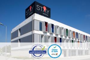 a rendering of a building with a sign on top at Stay Hotel Porto Aeroporto in Maia