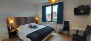 Postel nebo postele na pokoji v ubytování Hotel La Cascada
