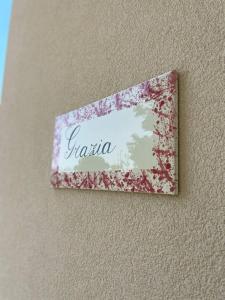 Certifikát, hodnocení, plakát nebo jiný dokument vystavený v ubytování Le stanze di chiara