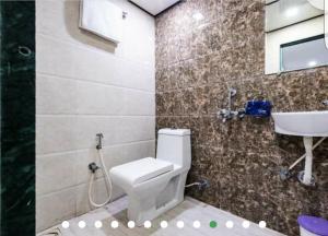 Koupelna v ubytování Hotel Guestinn Residency