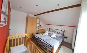Postel nebo postele na pokoji v ubytování Apartman Patricia