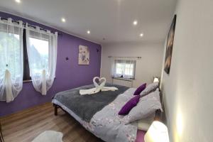 Postel nebo postele na pokoji v ubytování Apartman Patricia