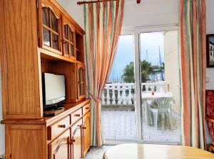 Et tv og/eller underholdning på Marina Sunrise Puerto