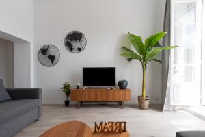 Telewizja i/lub zestaw kina domowego w obiekcie PLAZA MAYOR by MONARO