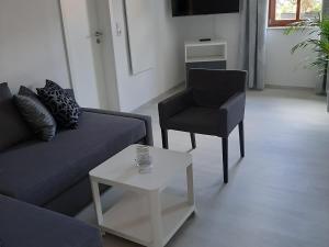 Posezení v ubytování Bugenhagen - Classic Appartements