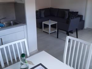 Posezení v ubytování Bugenhagen - Classic Appartements