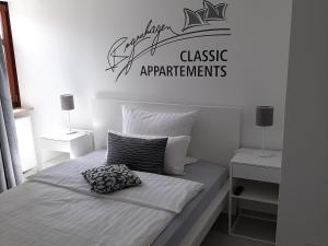 Postel nebo postele na pokoji v ubytování Bugenhagen - Classic Appartements