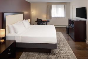 Llit o llits en una habitació de The Andrew Hotel