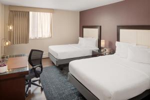 Llit o llits en una habitació de The Andrew Hotel